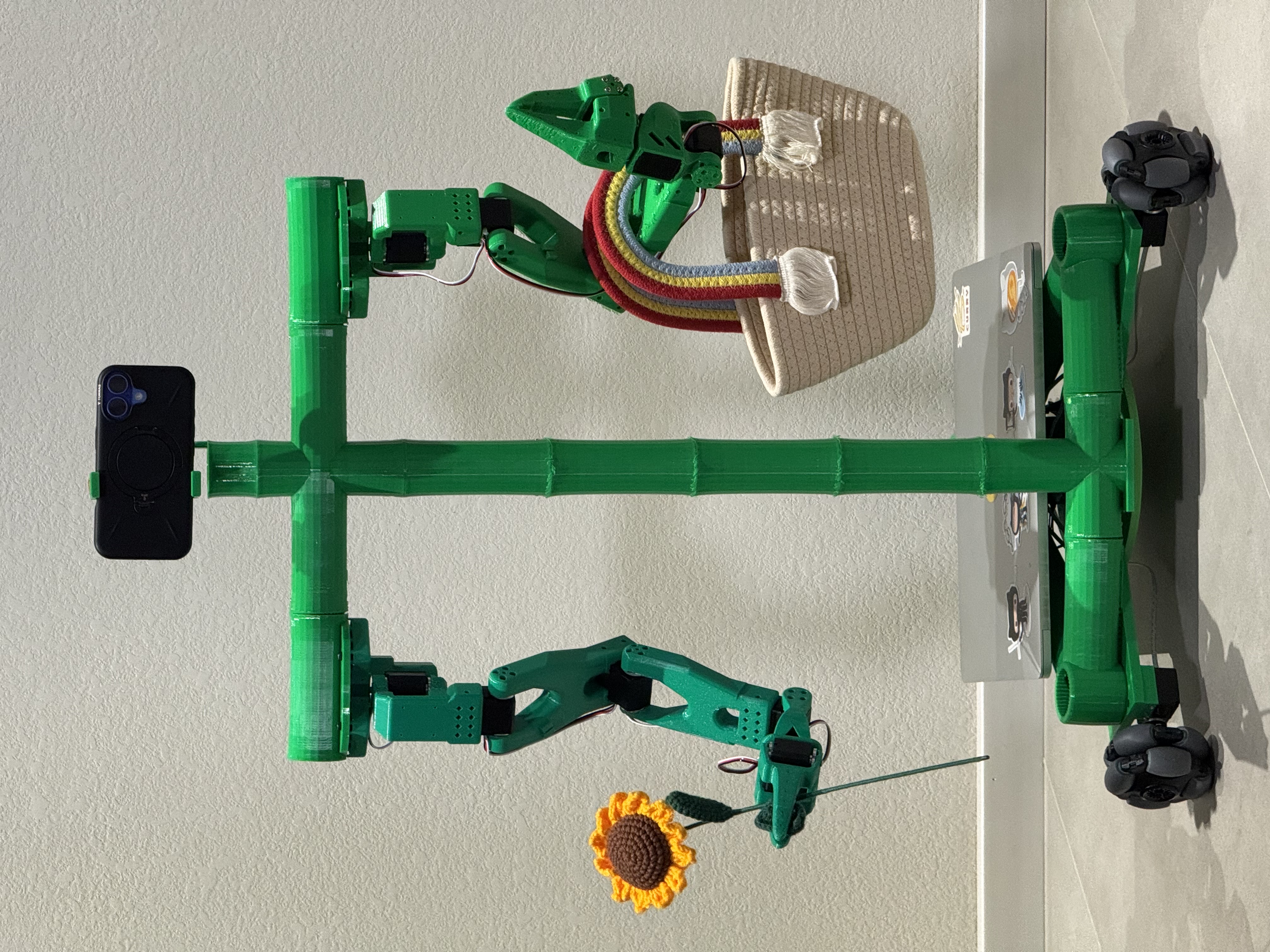 BamBot - A green robotic assistant holding a sunflower and a basket