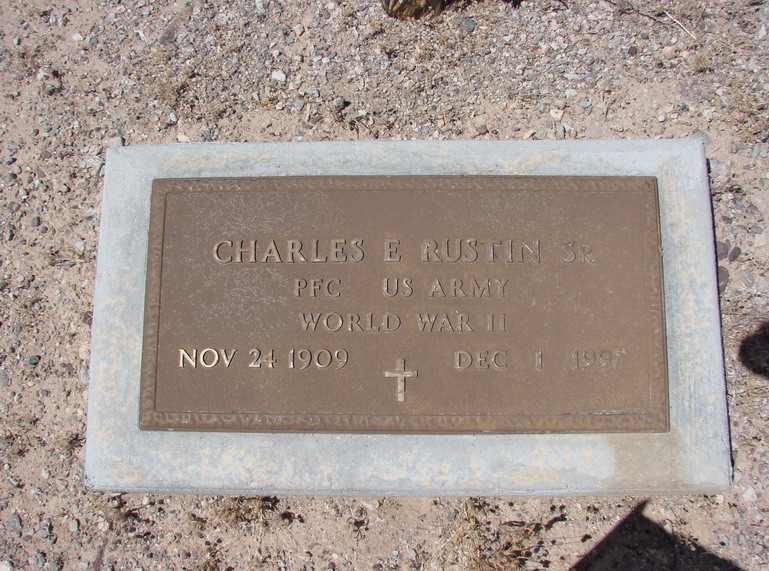 Grave marker for Charles E. Rustin Sr., identifying him as a U.S. Army World War II veteran
