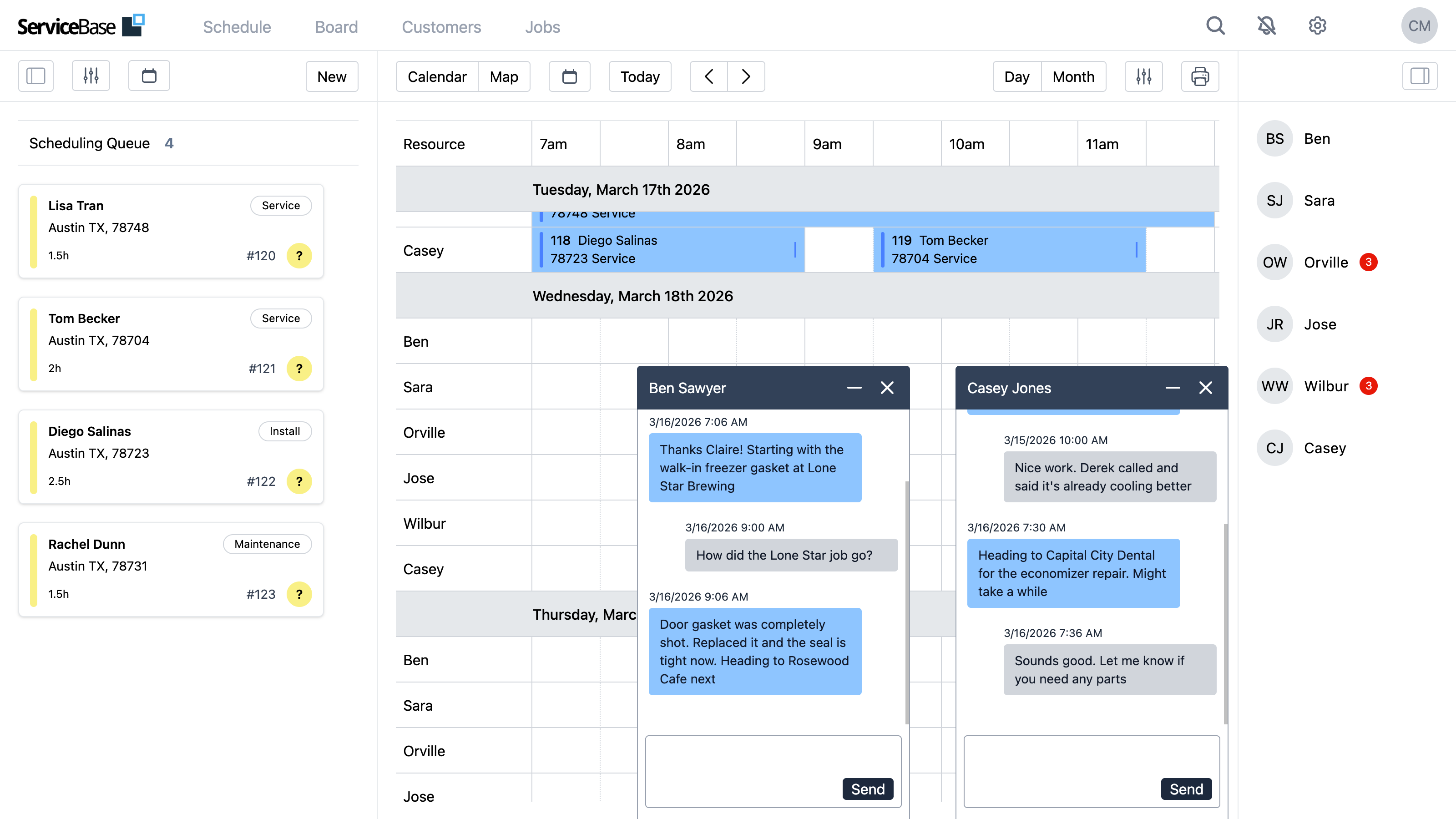 ServiceBase schedule view with two open chat windows — dispatcher Claire messaging field technicians Ben Sawyer and Casey Jones about job progress, next stops, and parts, alongside the scheduling queue and technician roster