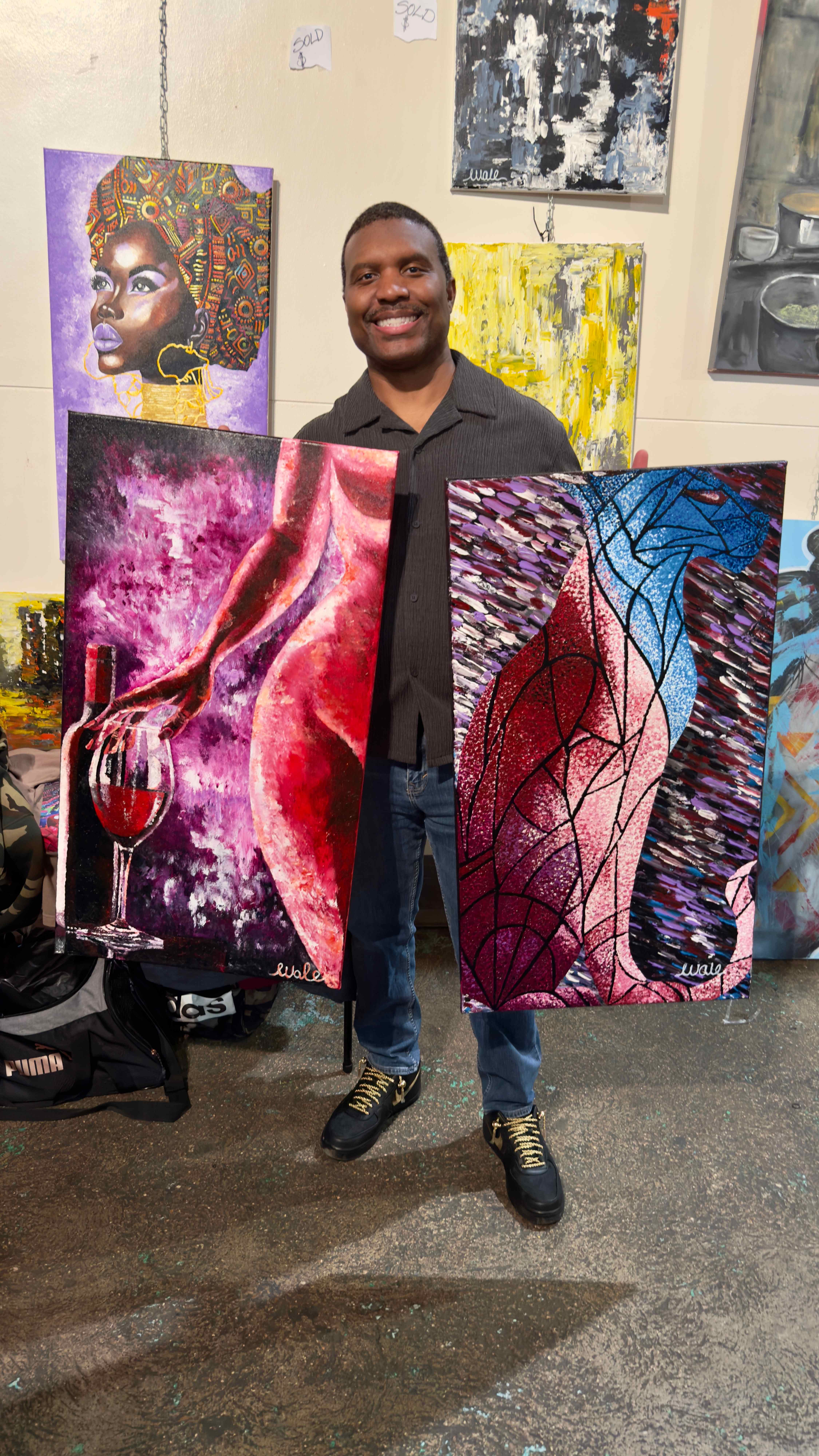 Artist displaying paintings at the LA Chocolate and Art Show