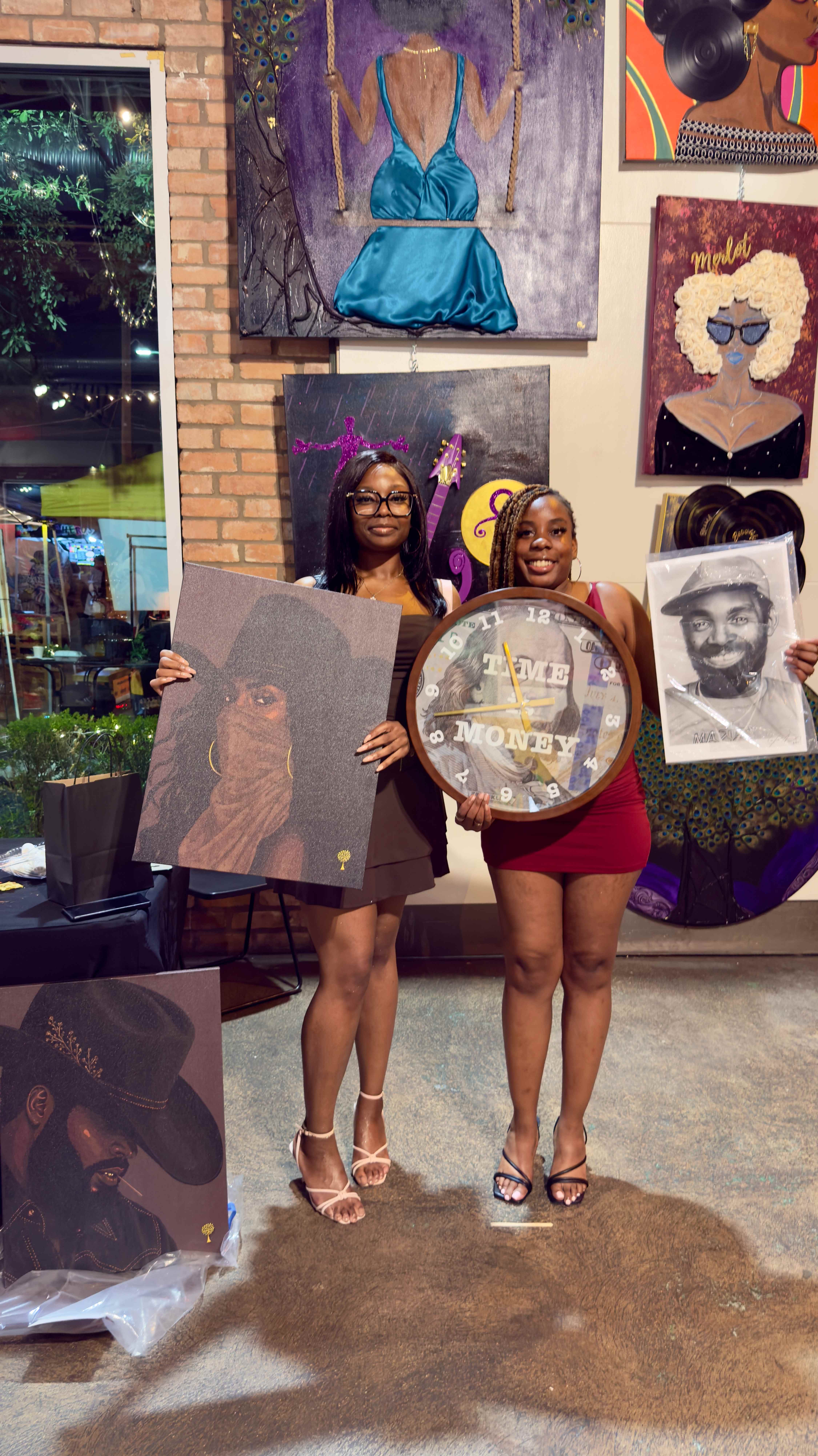 Artist standing with artwork at the LA Chocolate and Art Show