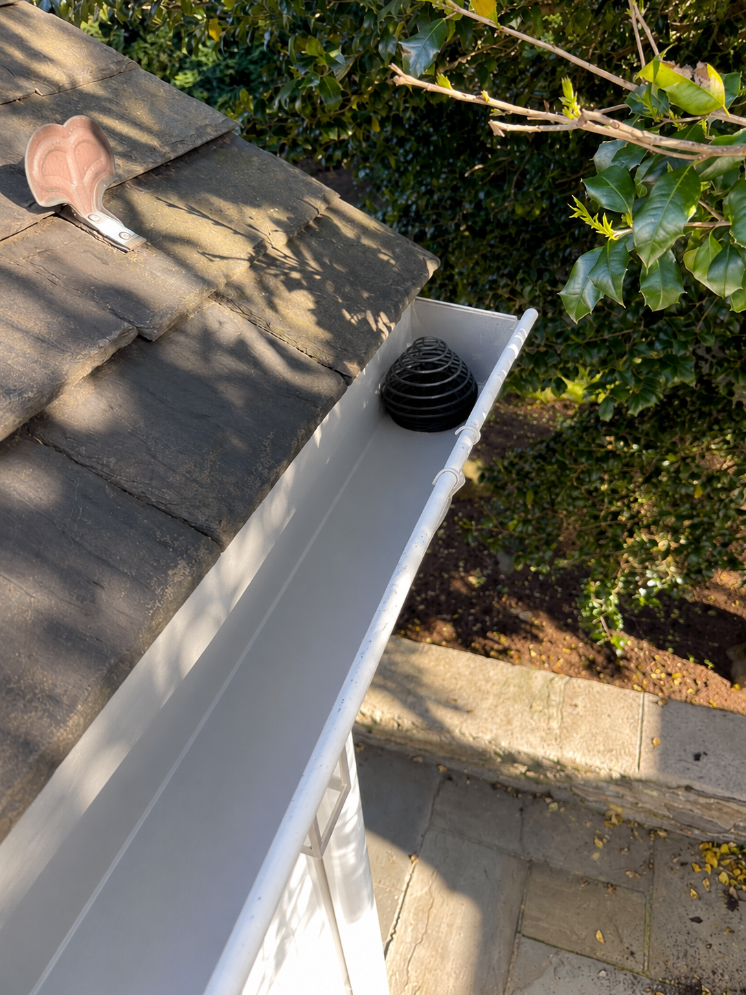 Clean white gutter after professional cleaning