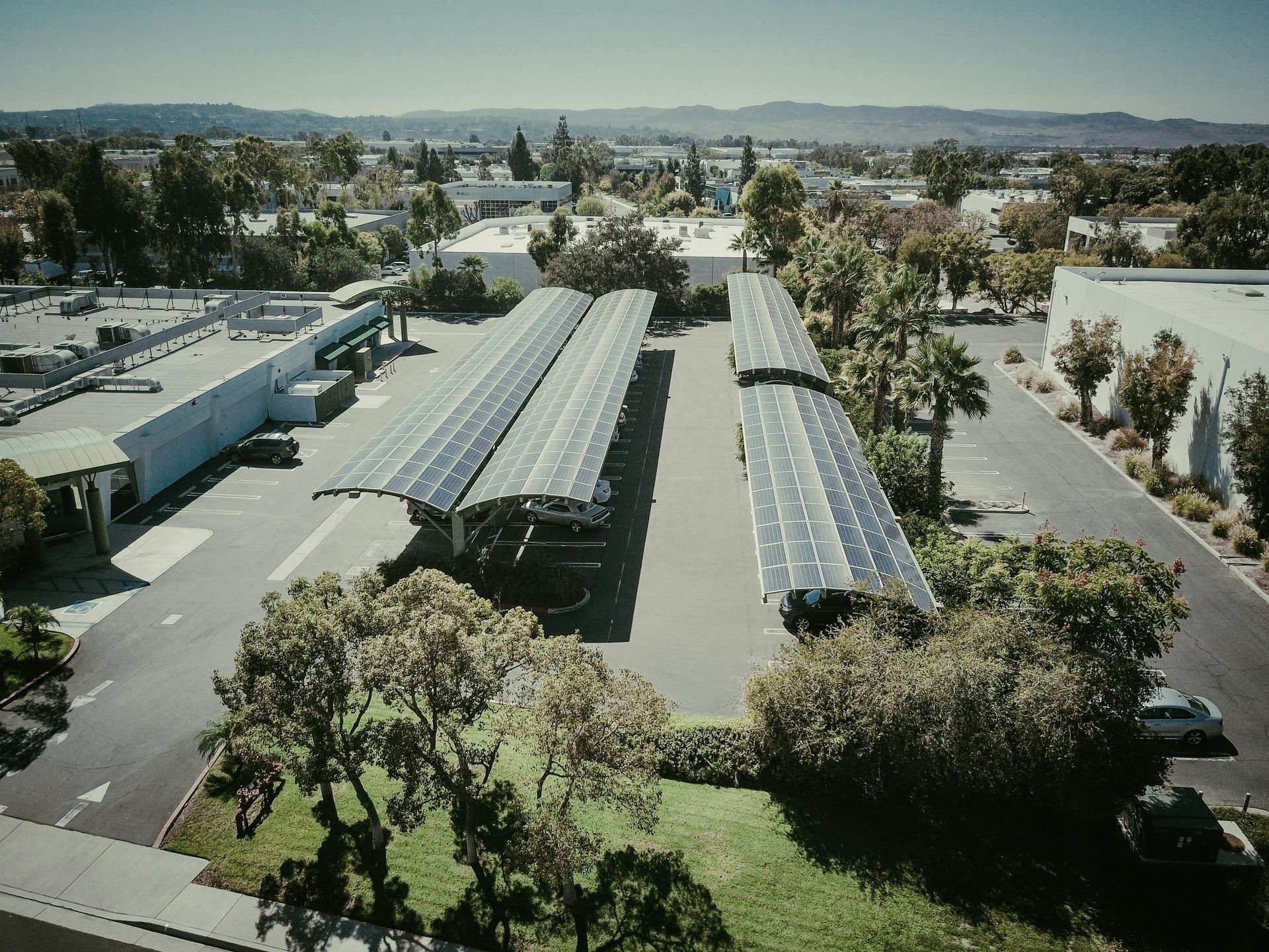 Aerial view of commercial carport with solar canopy installation