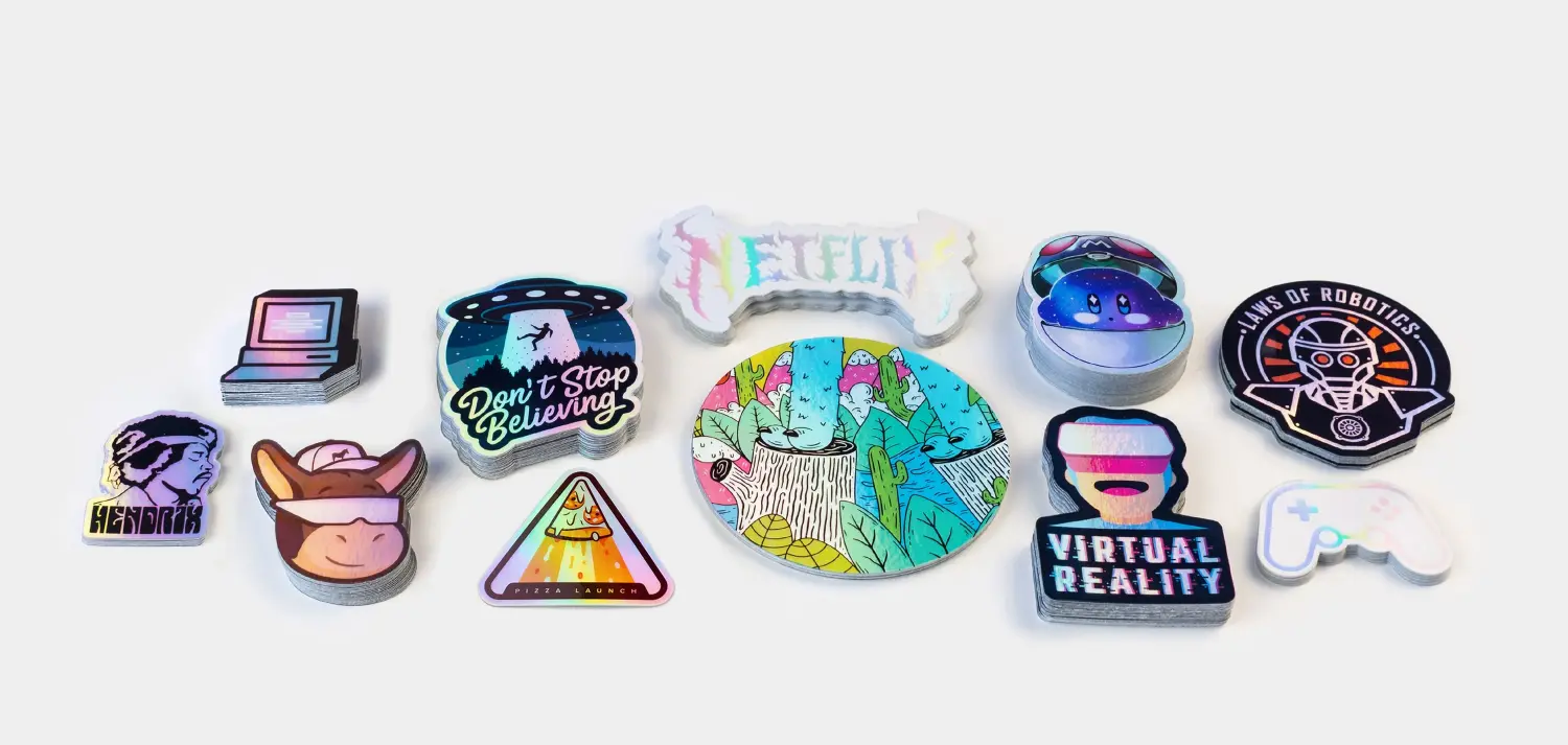 Holographic stickers with rainbow shimmer effect showing Netflix, Virtual Reality, and Hendrix designs