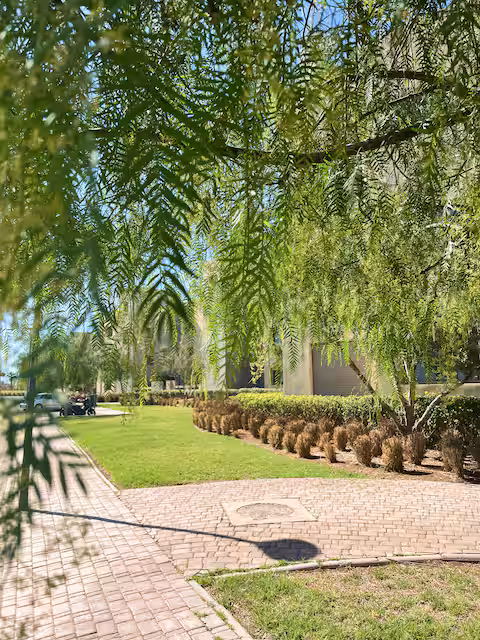 Private balcony with outdoor seating and garden views