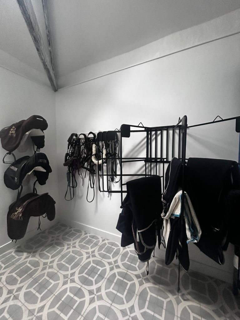 Completed tack room with geometric floor tiles