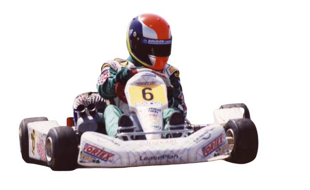 Professional kart racer demonstrating chassis dynamics