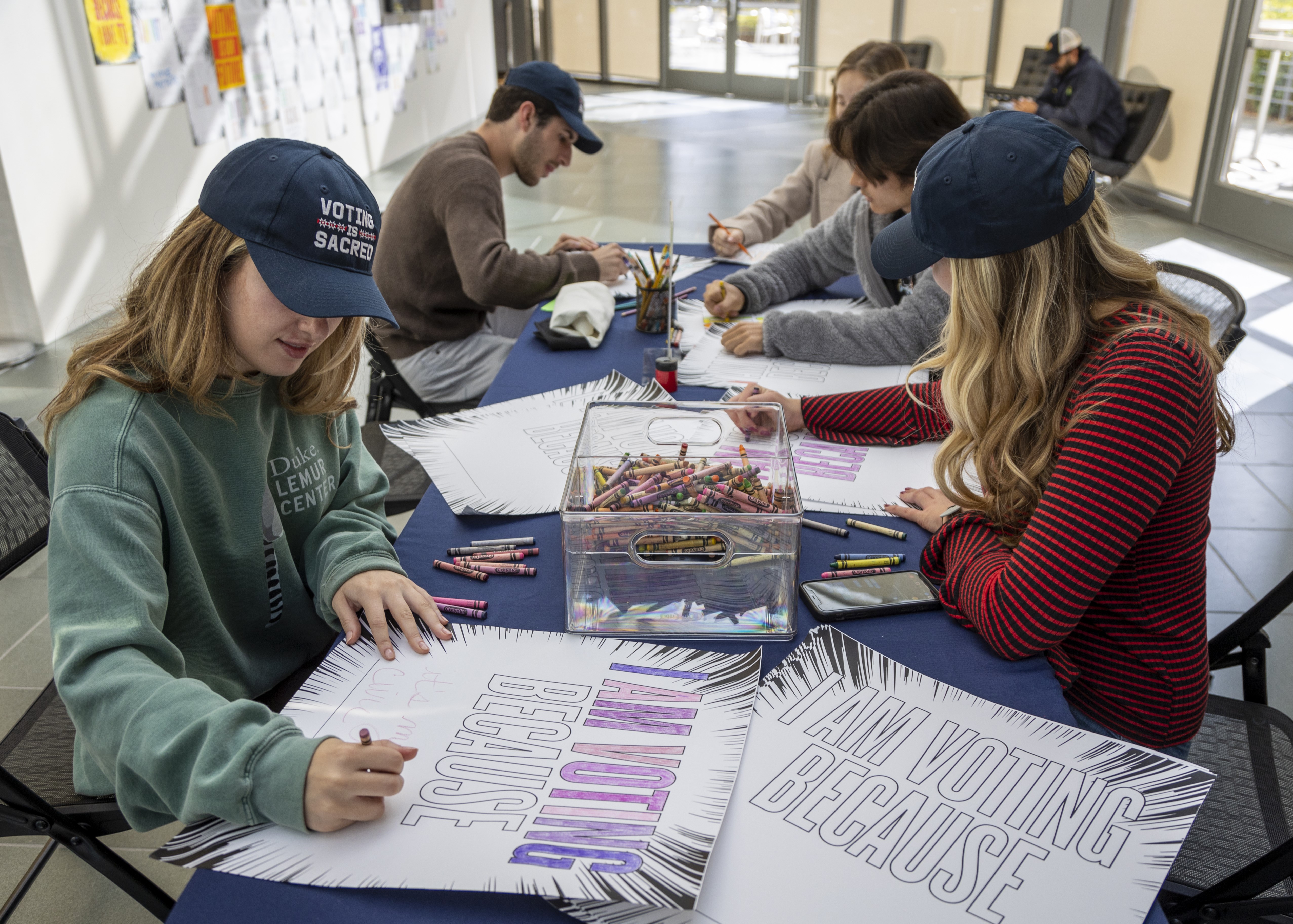 Students creating Democracy Day signage