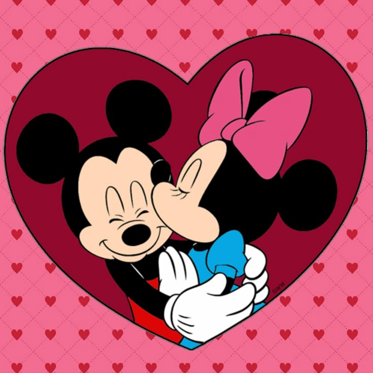 Mickey and Minnie inside a heart-shaped frame