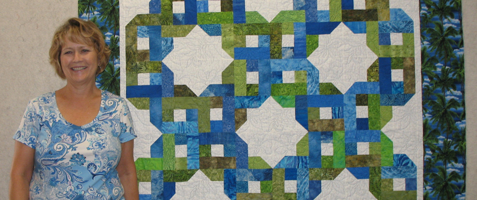 Susan K in her quilting studio