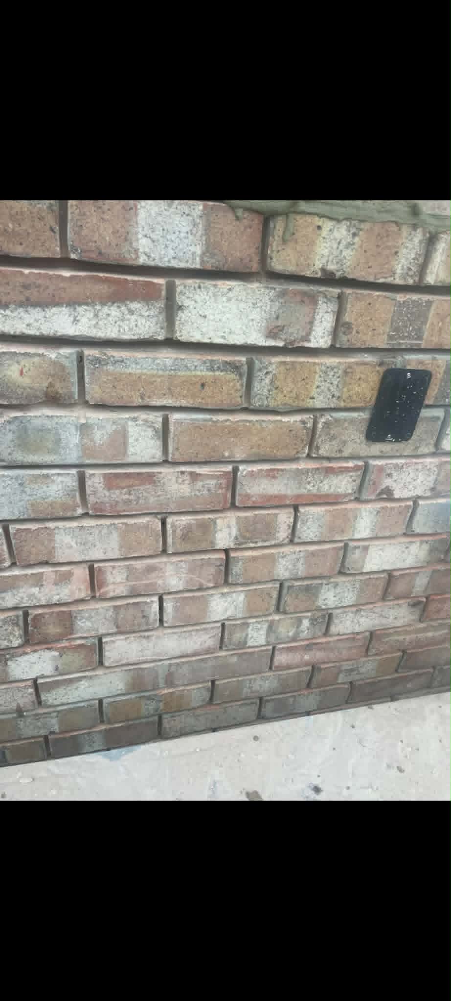 Weathered brickwork before repointing treatment