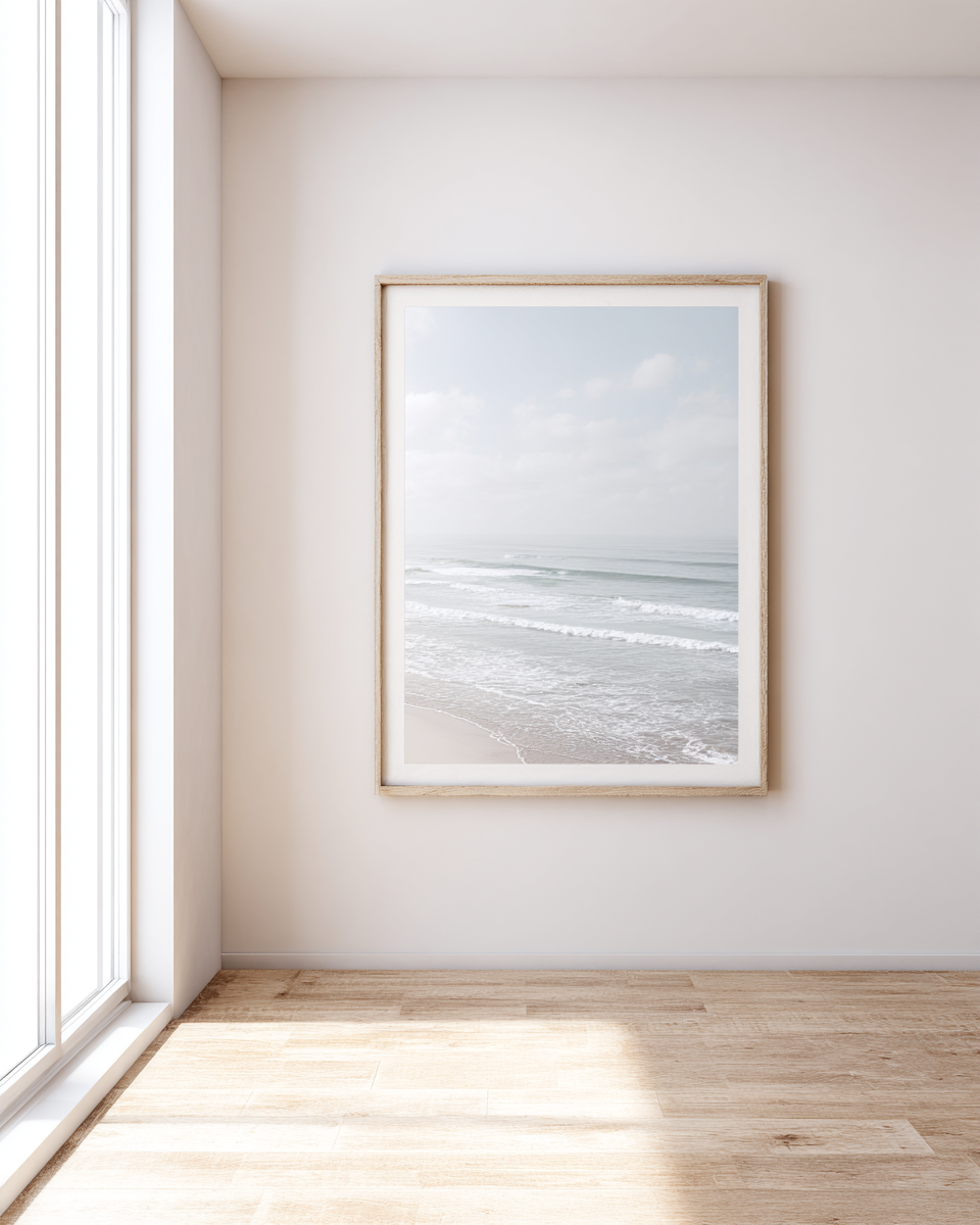 Coastal Silence II - Vertical portrait of gentle waves rolling onto shore under soft sky