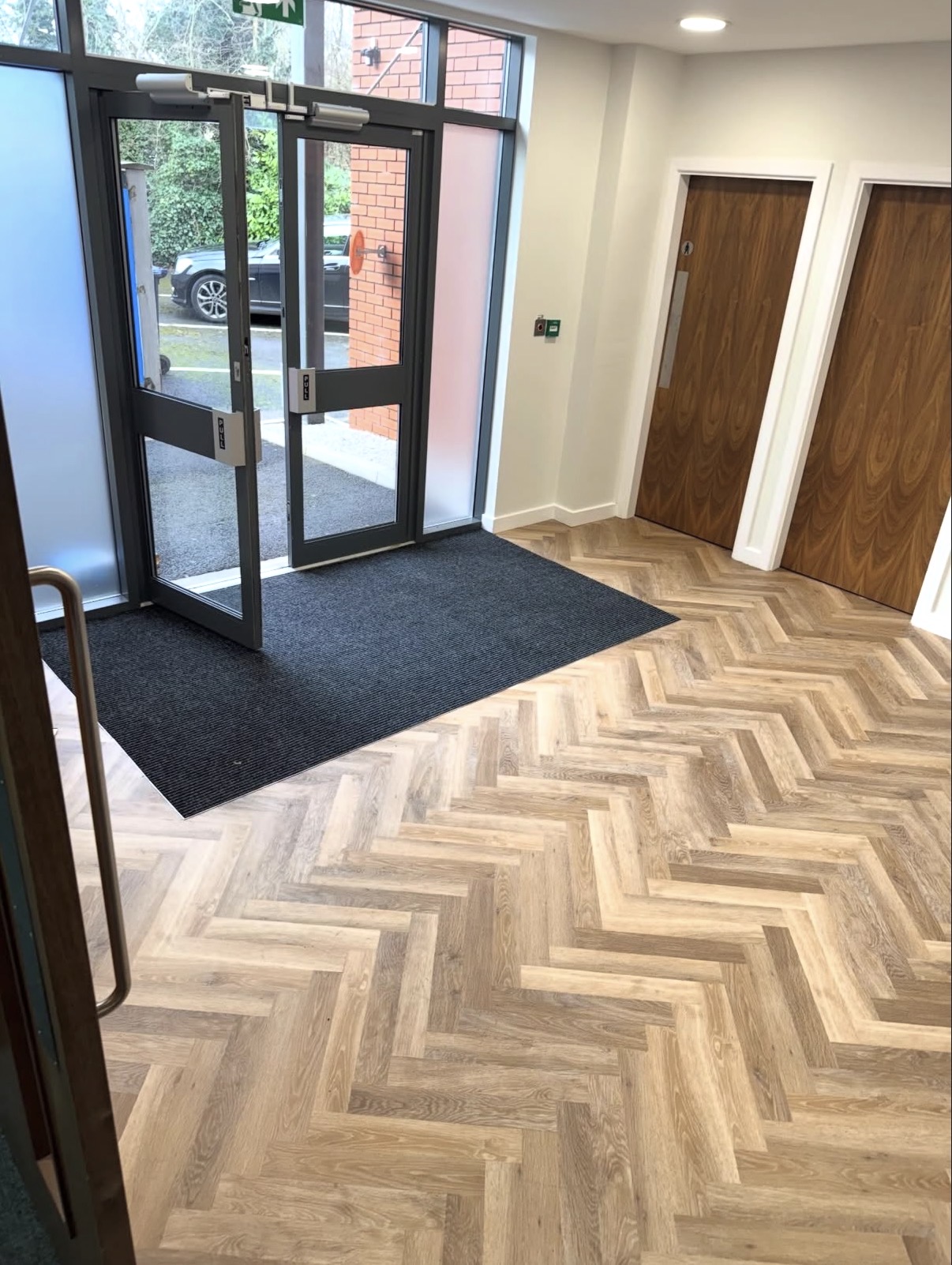 Entrance hall with herringbone pattern flooring