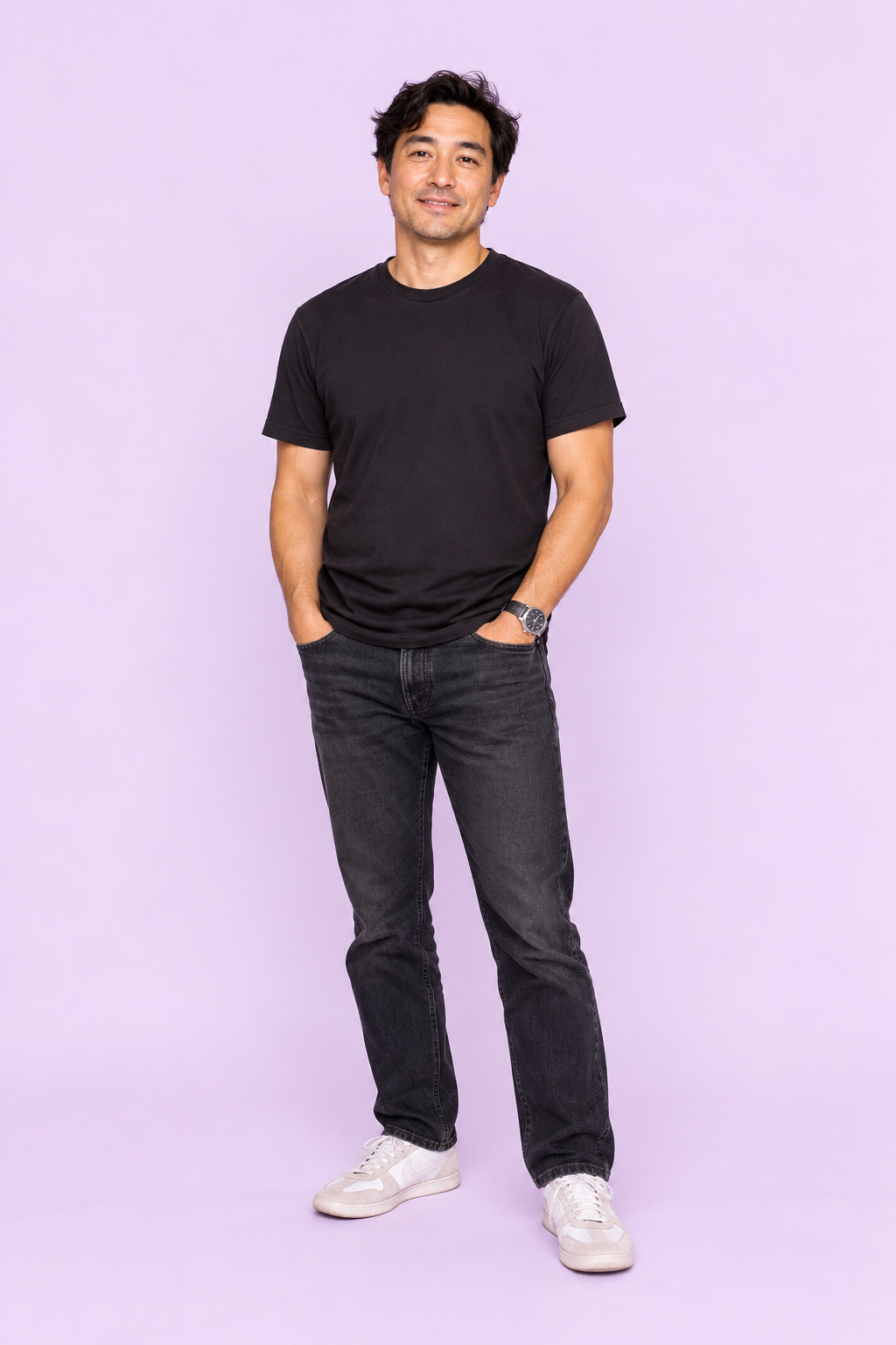 Winston Yamagata wearing a black T-shirt against a soft lavender background