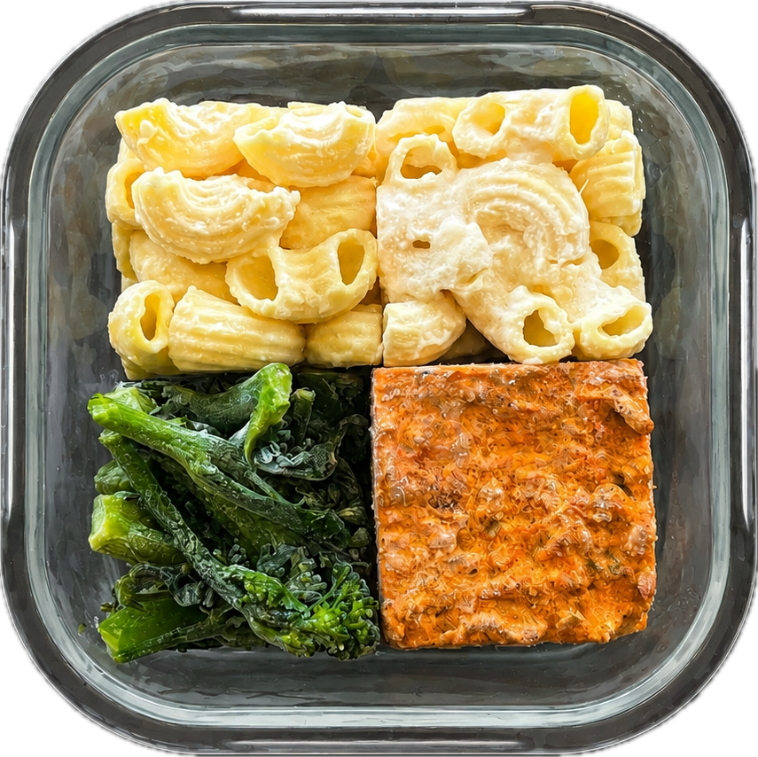 Mealy meal cubes — pasta, broccoli and protein in a glass container