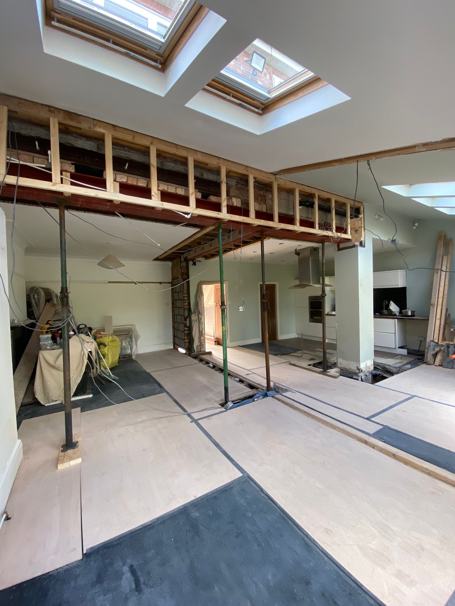 Open plan extension with exposed steel beams