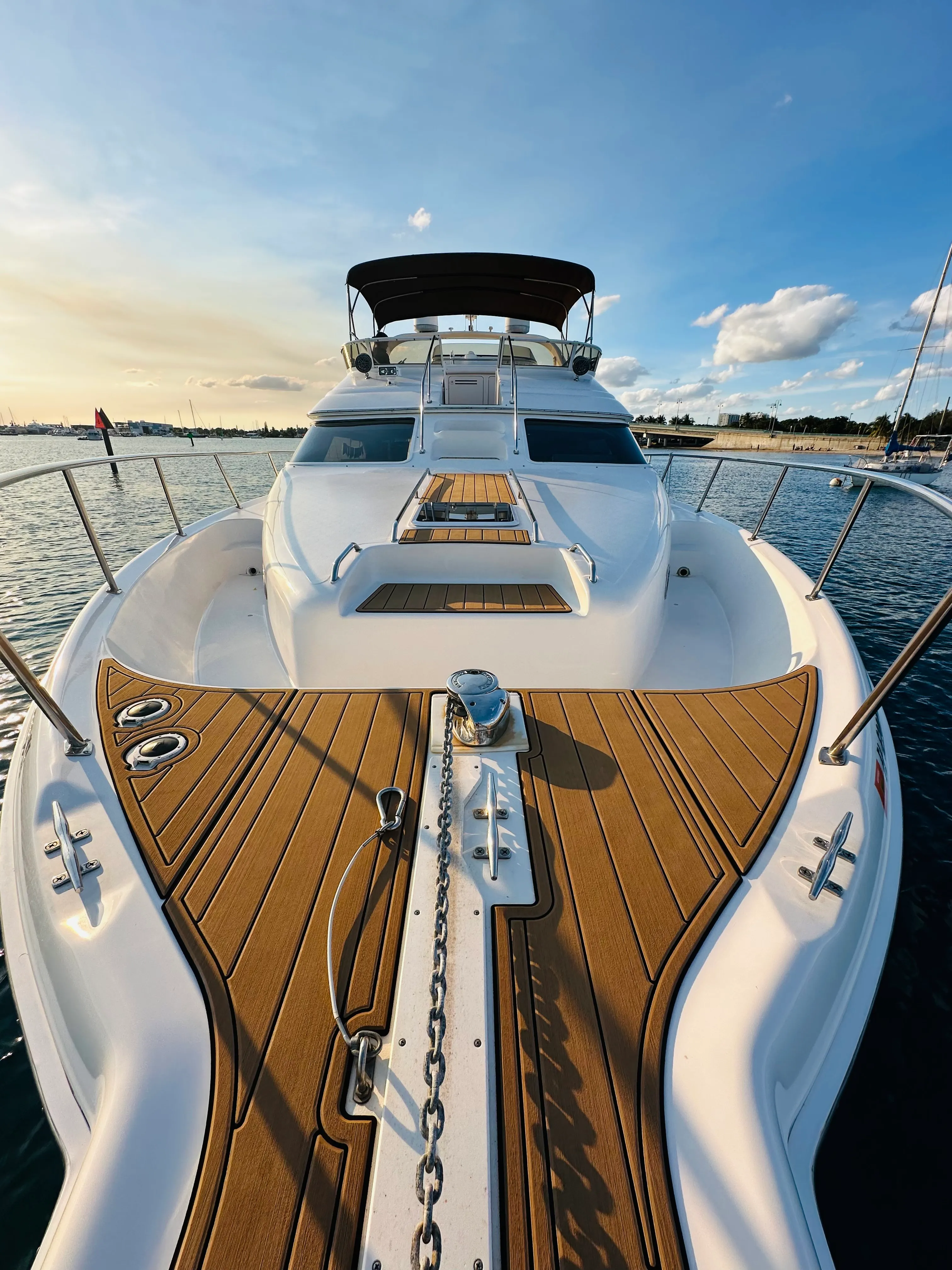 Sea Ray yacht stern view anchored in crystal clear water