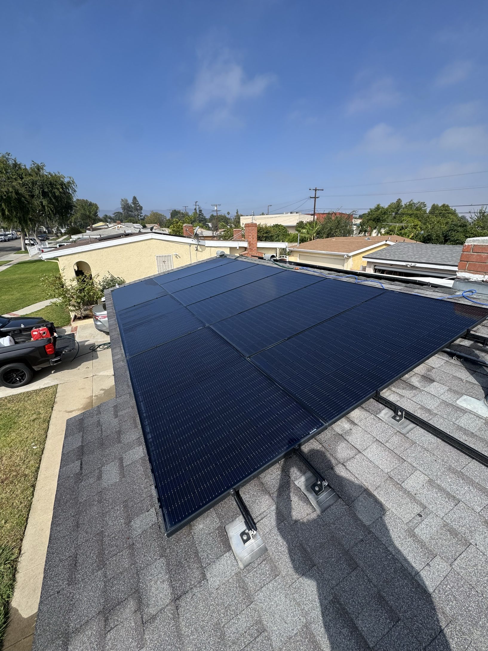 Large solar array after cleaning with blue sky
