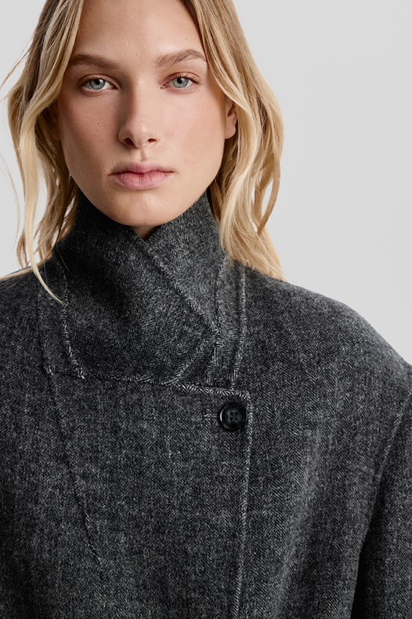 Catalogue close-up — blonde model, grey herringbone coat