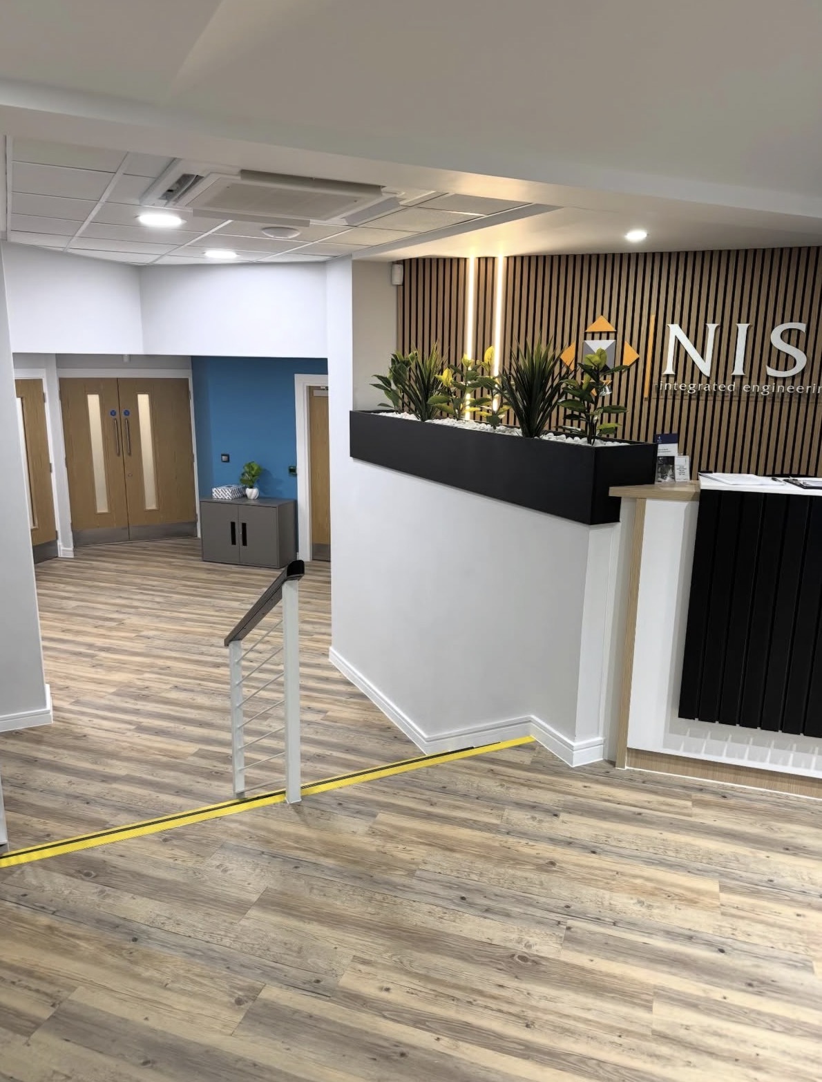 Commercial reception area with luxury vinyl plank flooring