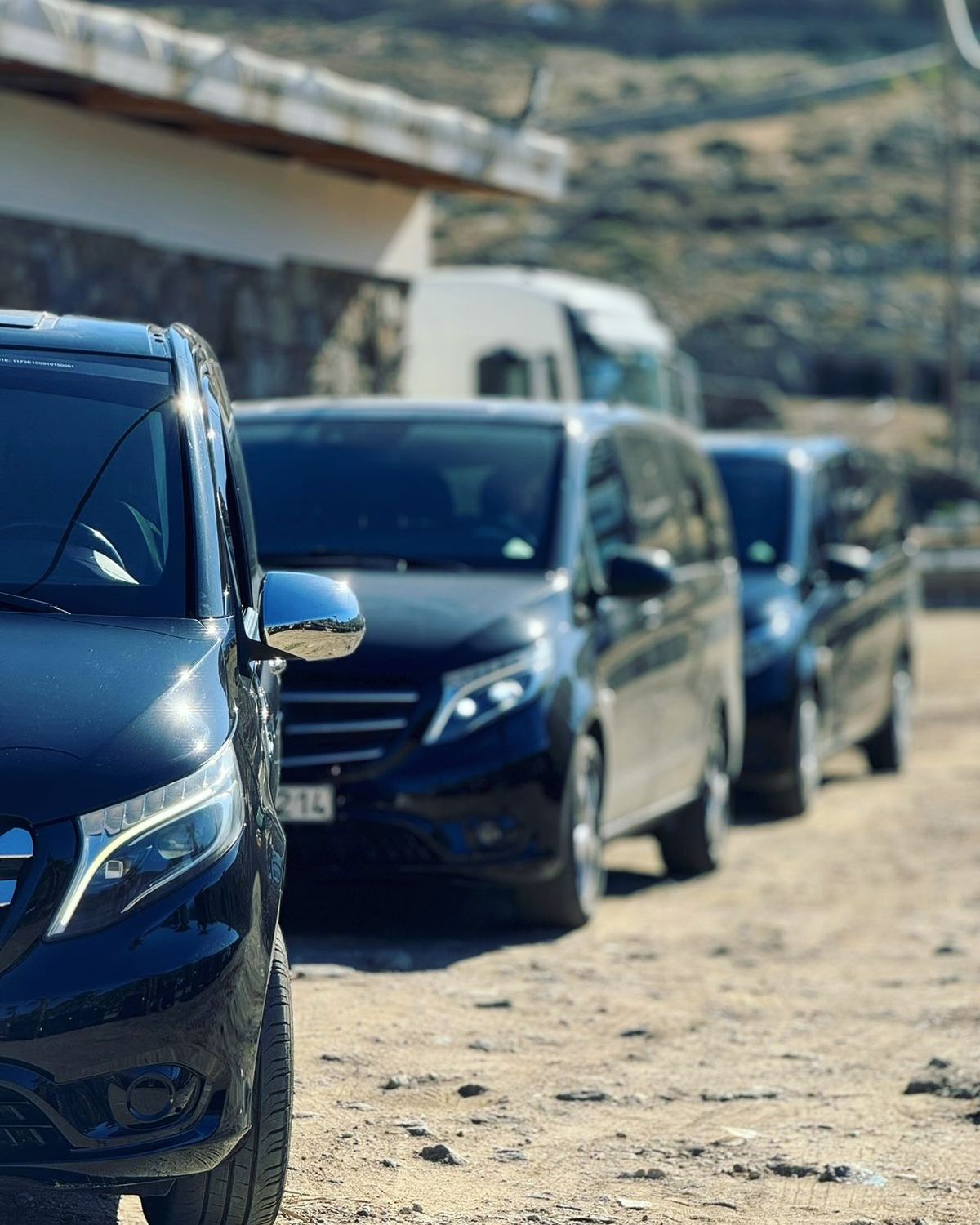 Blue Coast Trips fleet — Mercedes Vito vans lined up in Morocco