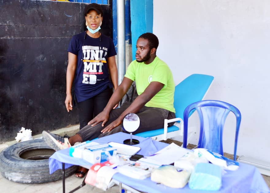 Dental team preparing equipment at their station