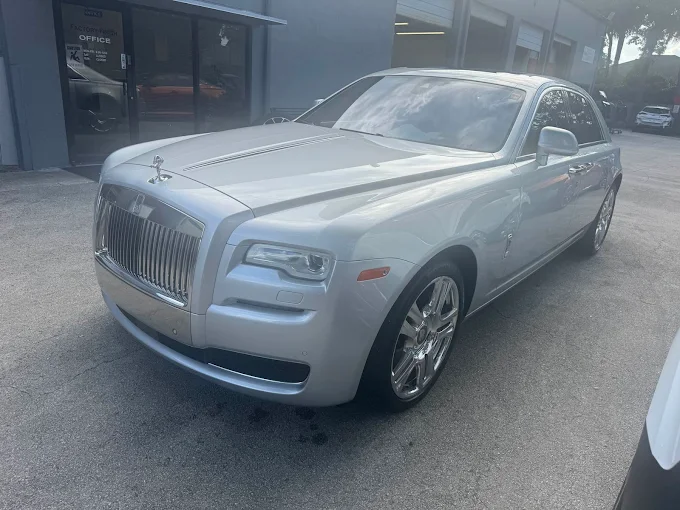Silver Rolls-Royce Ghost serviced at Factory Finish Paint and Body in Lake Worth Beach