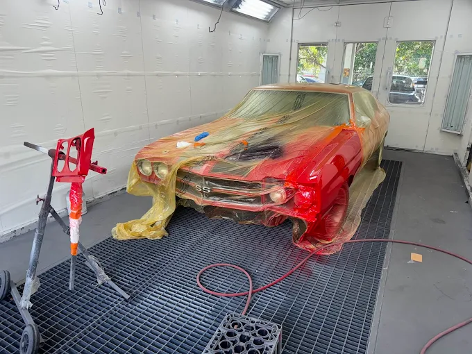 Classic Chevelle SS masked and being painted in the Factory Finish spray booth