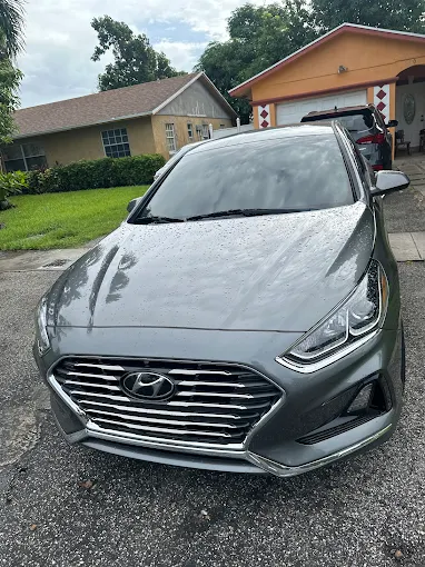 Gray Hyundai Sonata serviced by Factory Finish Paint and Body and returned to its owner in Palm Beach County