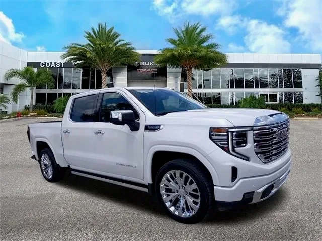 White GMC Sierra Denali pickup serviced by Factory Finish Paint and Body