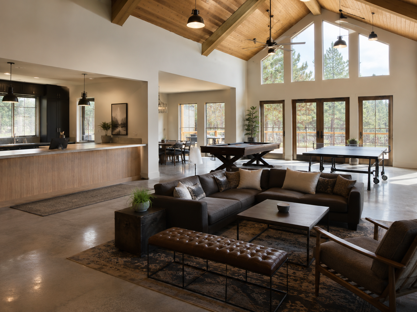 Lodge interior — open living and game room with ping-pong and pool table