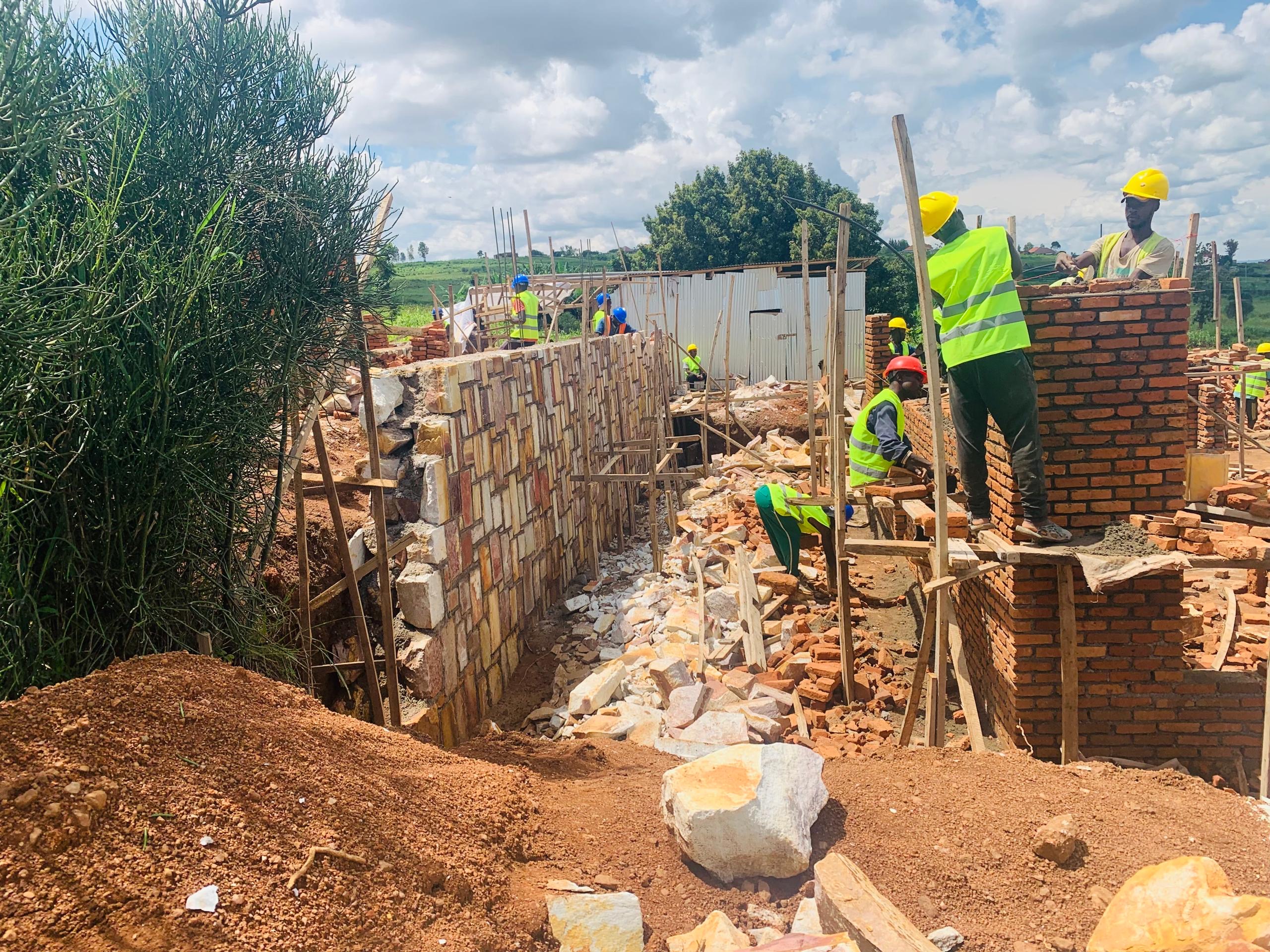 Stone retaining wall under construction