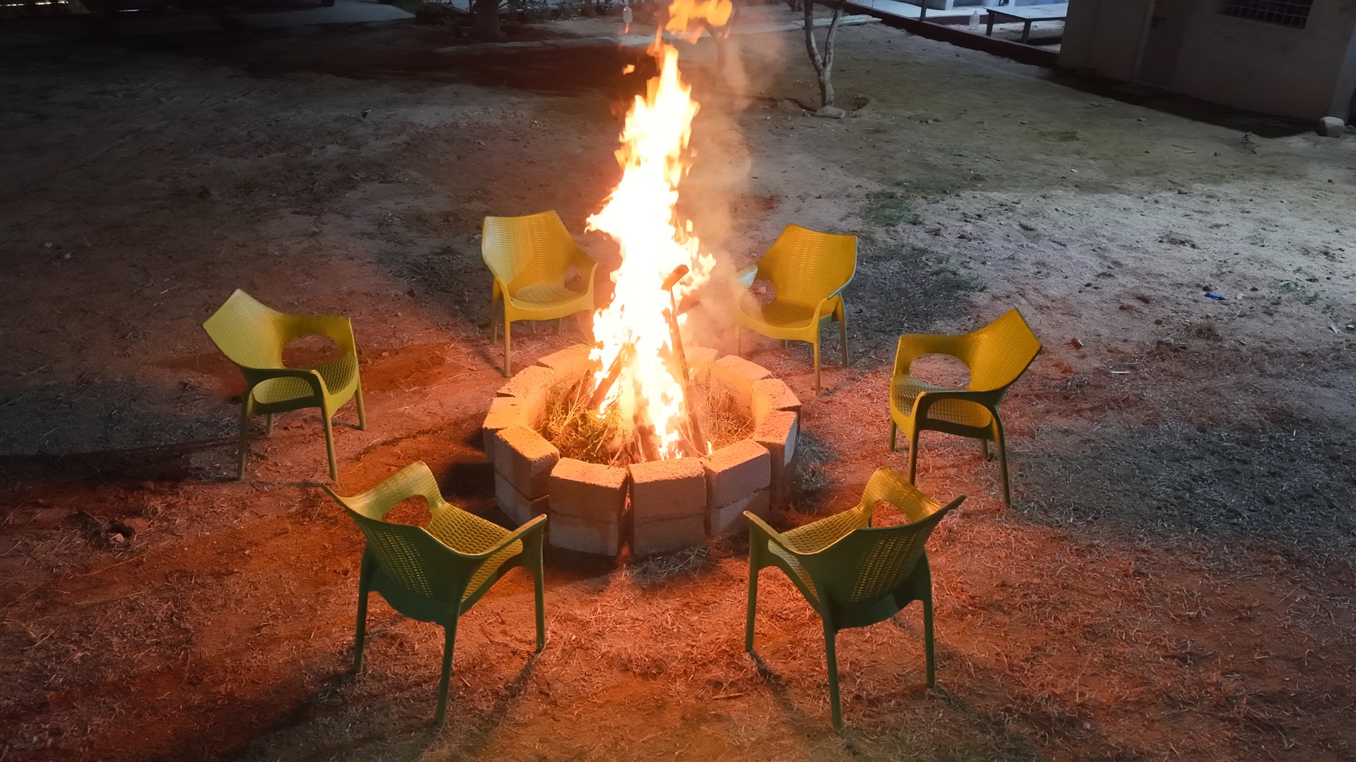 Campfire circle arranged for an evening gathering.