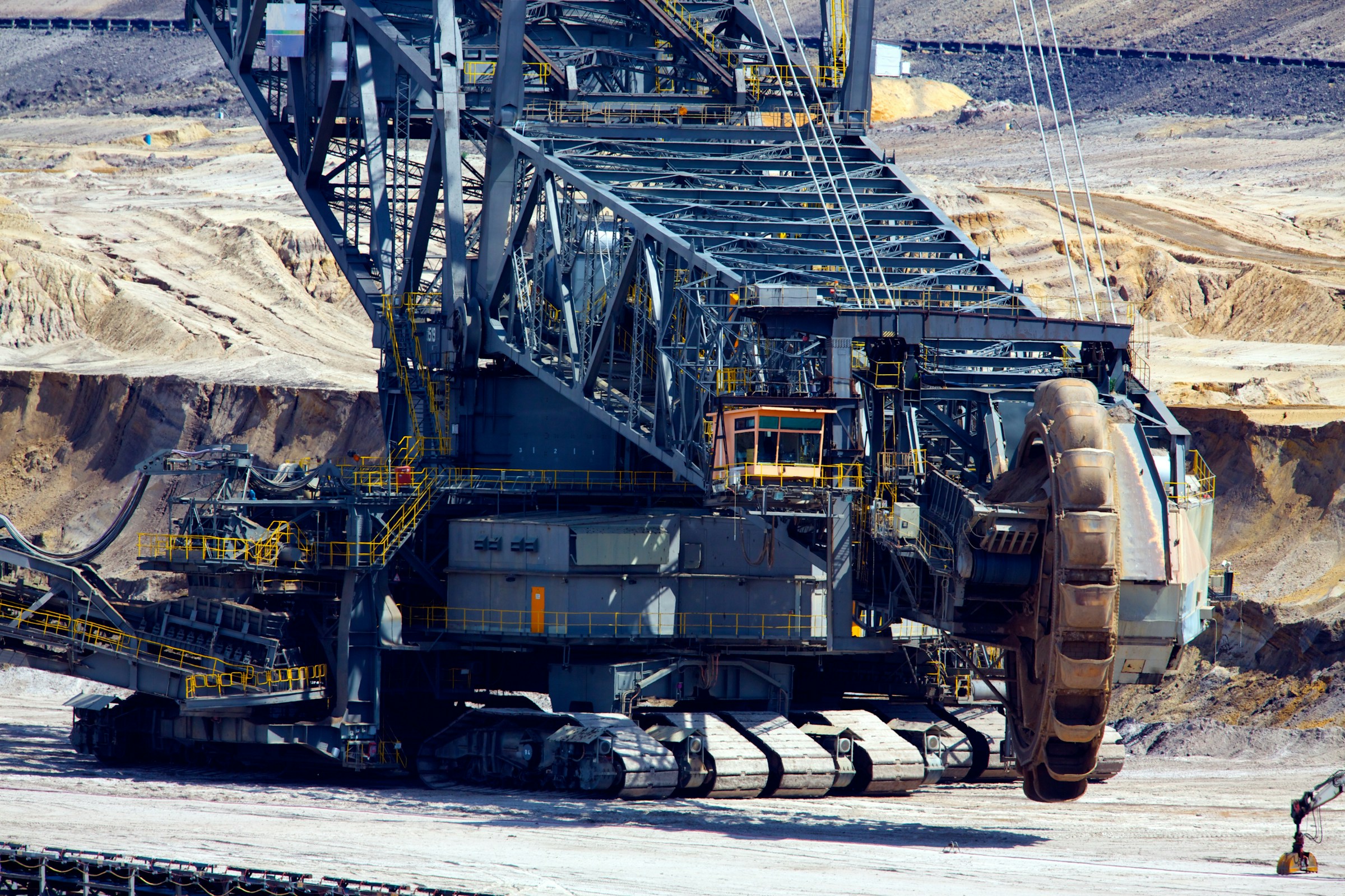 Massive bucket wheel excavator in an open-pit mine
