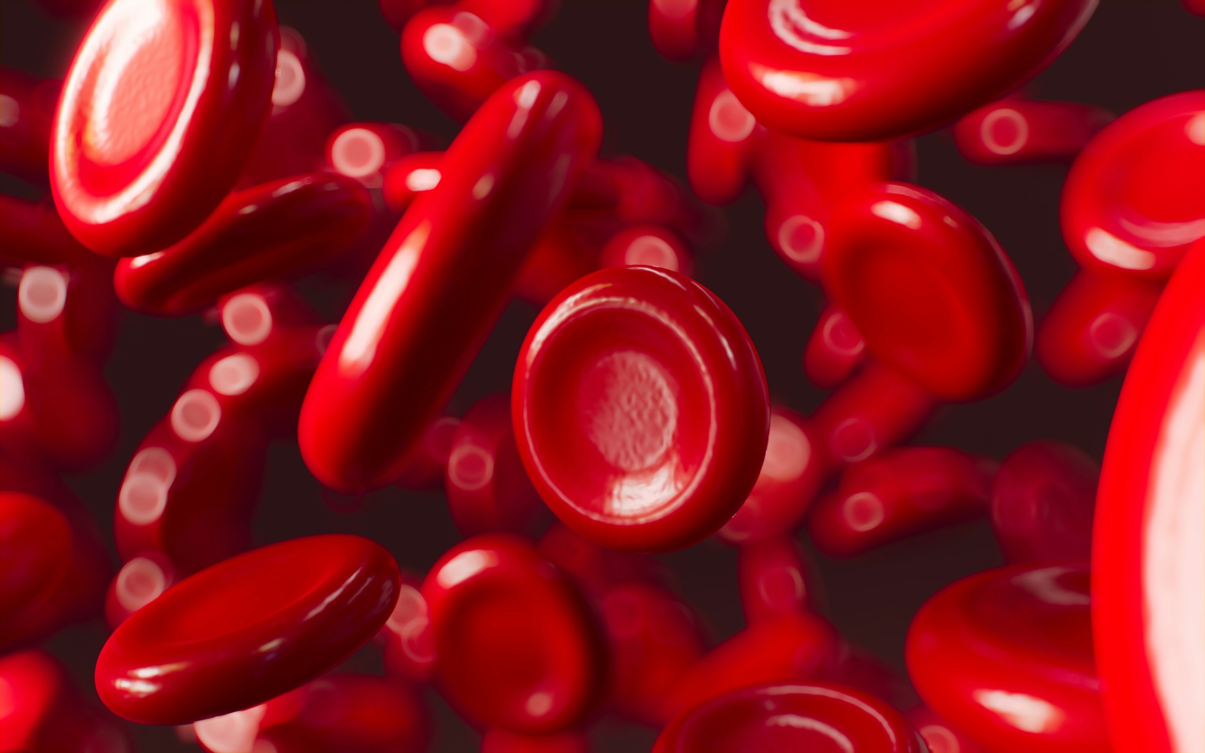 3D render of red blood cells flowing through bloodstream