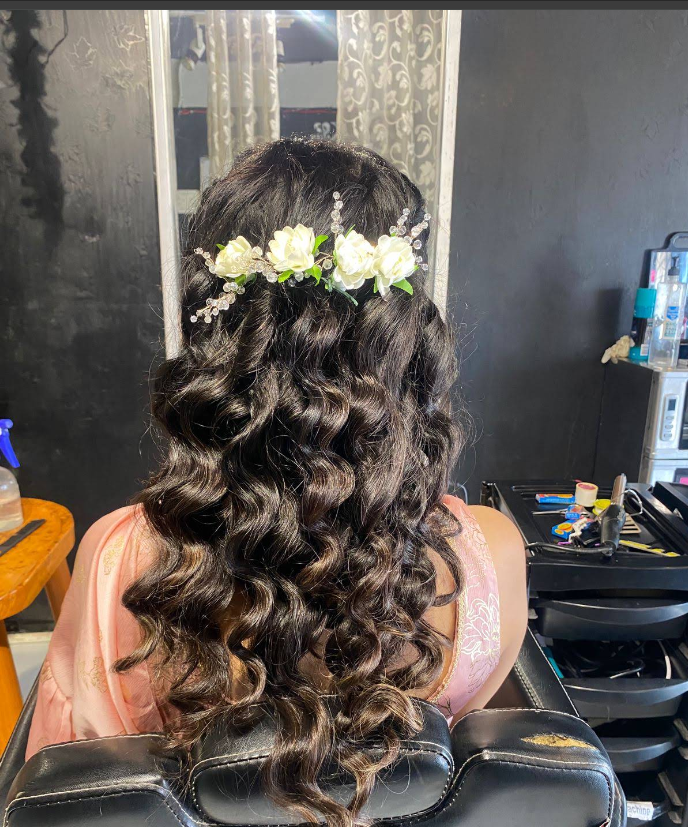 Bridal curls with floral hair accessories at Kaizen