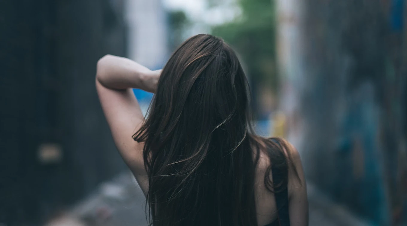 Beautiful long dark hair styled by Sabrina Beltrano