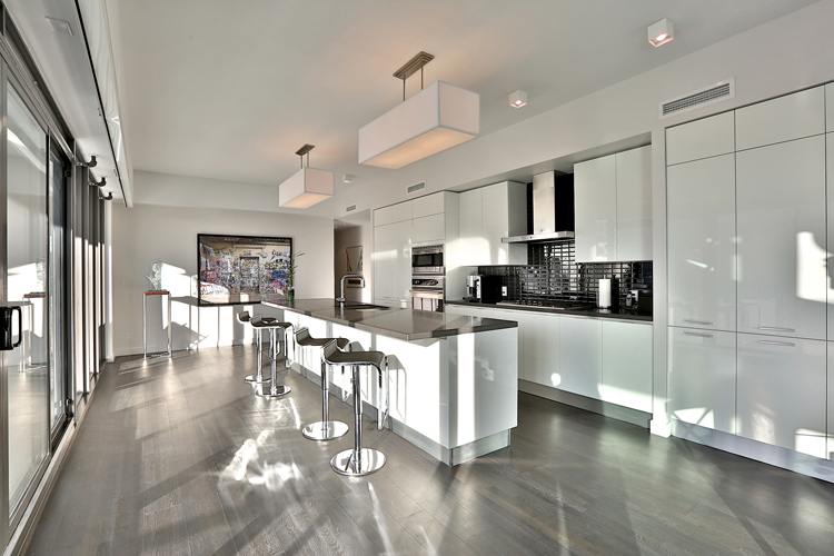 Modern luxury kitchen with white cabinets and island