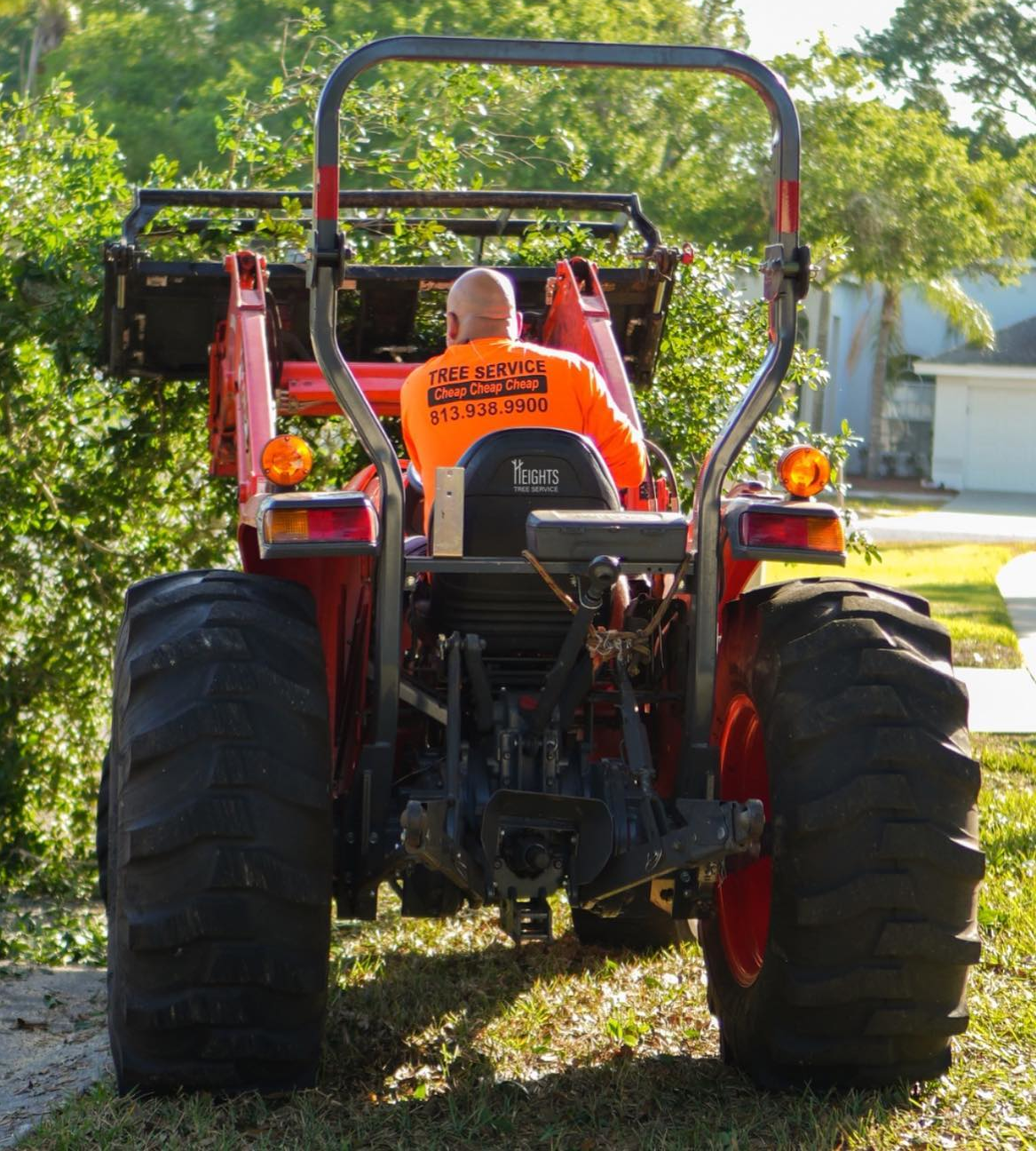 Heights Tree Service heavy equipment - Backhoe loader