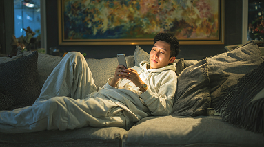 Man relaxing on sofa