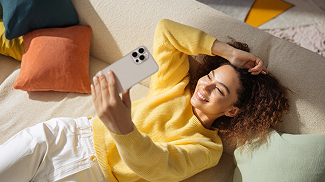 Woman lying down with phone