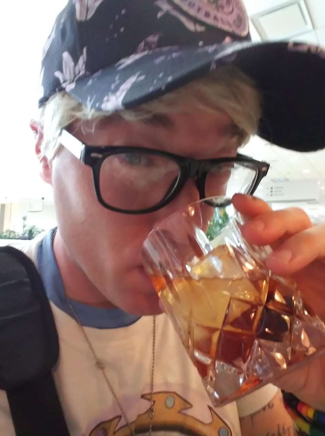 Kevin wearing glasses and a patterned cap