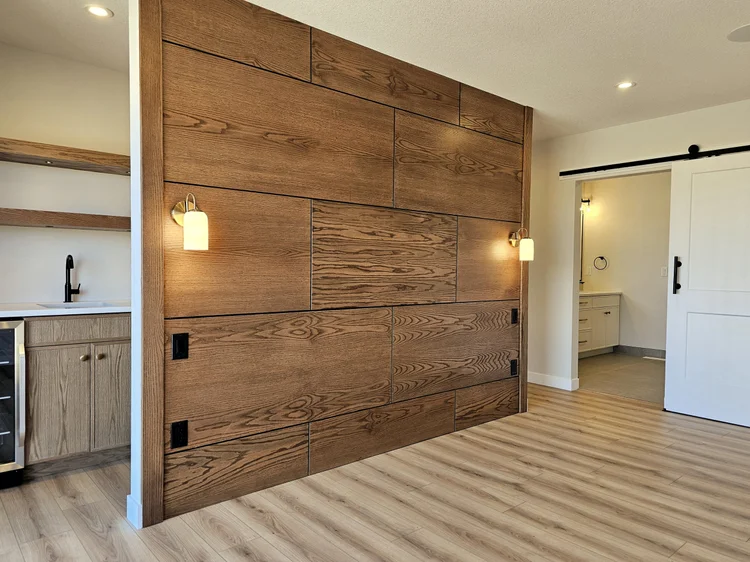 Custom wood accent wall with integrated storage