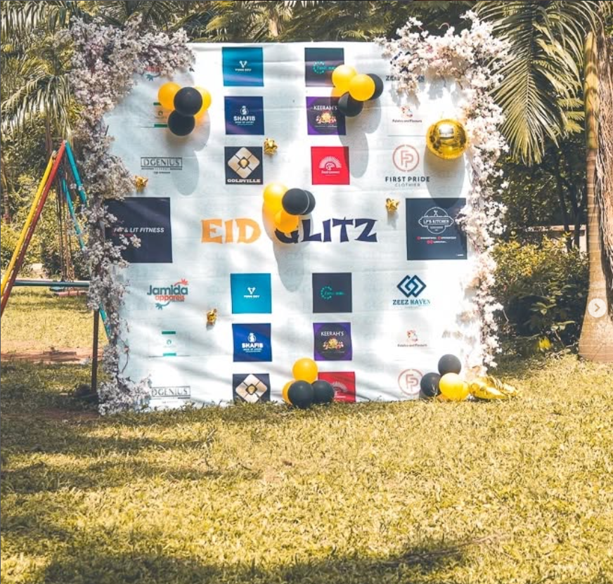 EidGlitz sponsor wall with partner logos and festive decorations