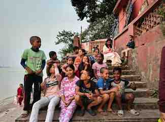 Children and mentors together outdoors