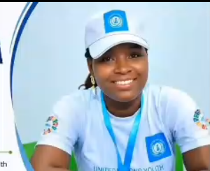 Ambassador Vivian Adaora Iloh wearing a white cap and blue lanyard