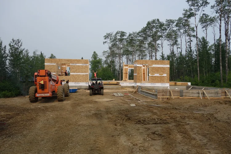 Framing stage with telehandler