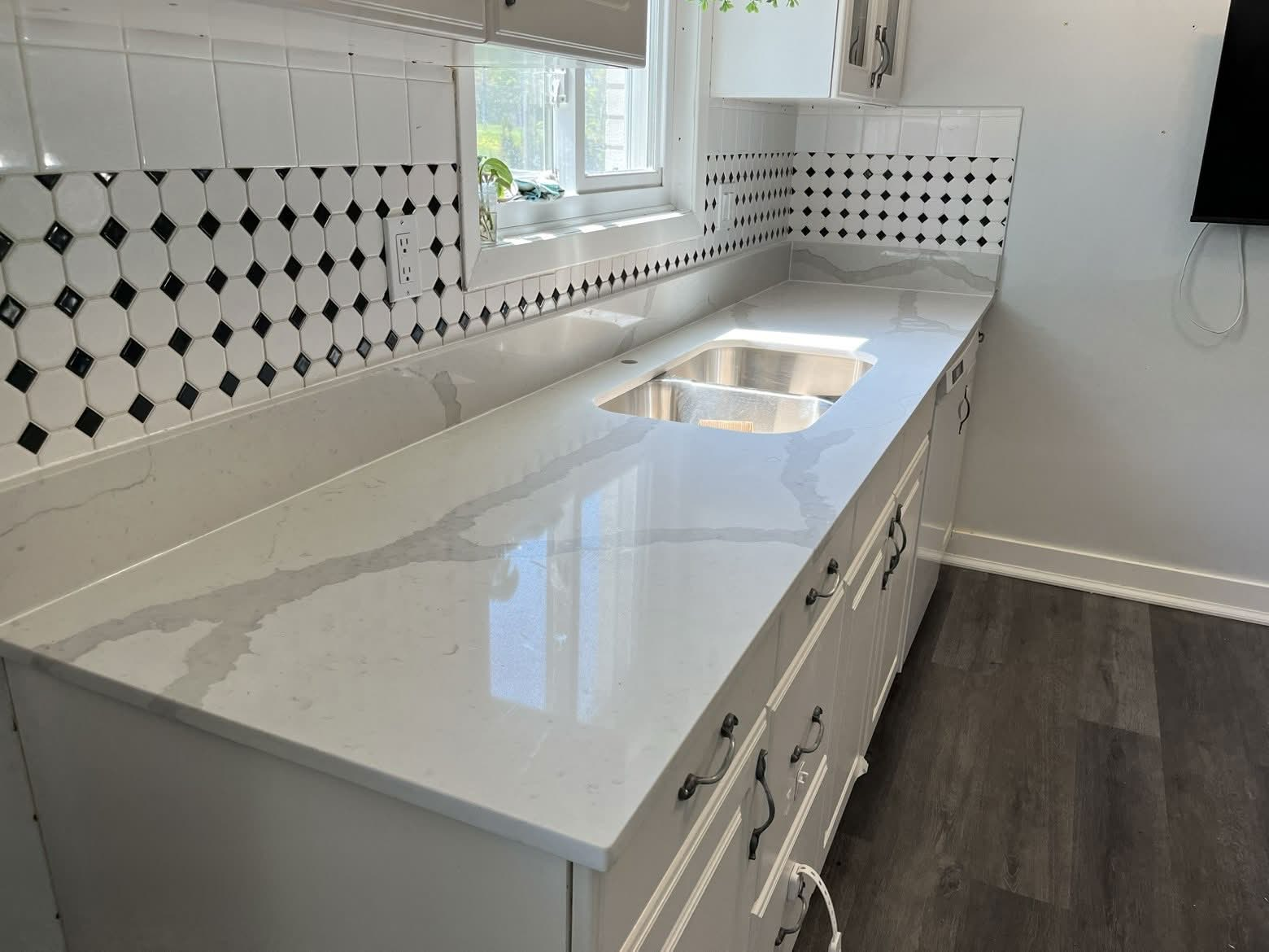 White kitchen with quartz countertop
