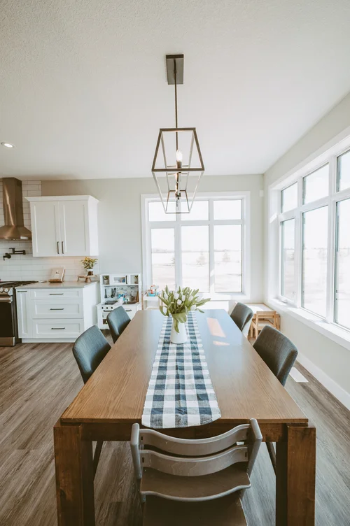 Dining table with geometric chandelier