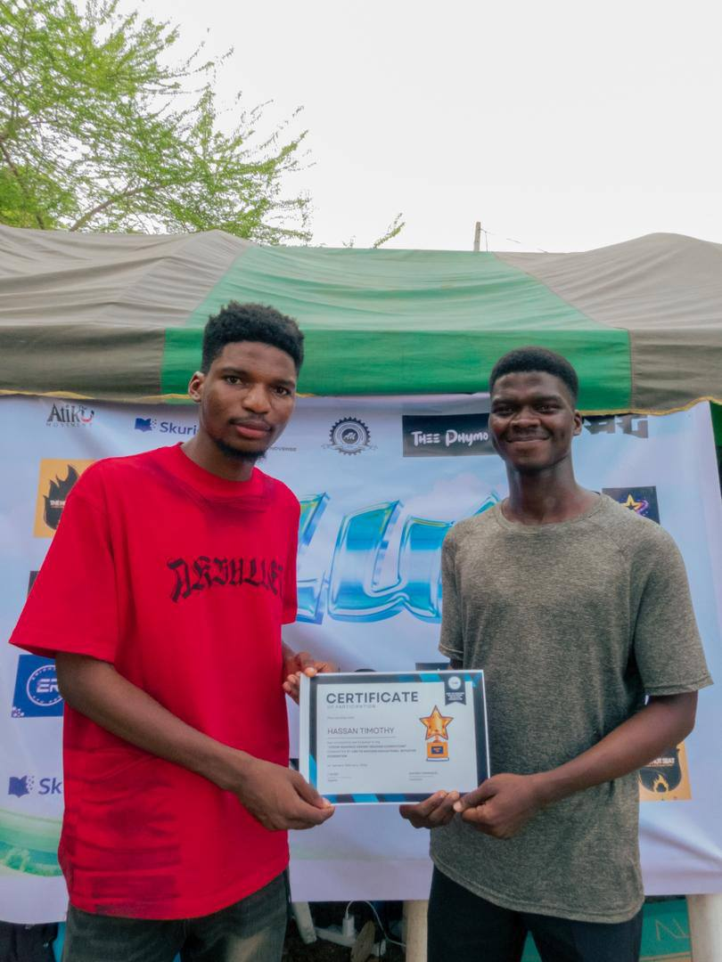 Hassan Timothy receiving certificate